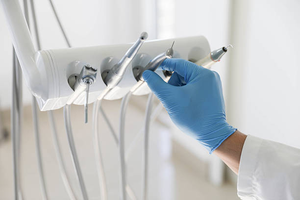 Professional Tooth Extraction technician working in Zeeland, MI